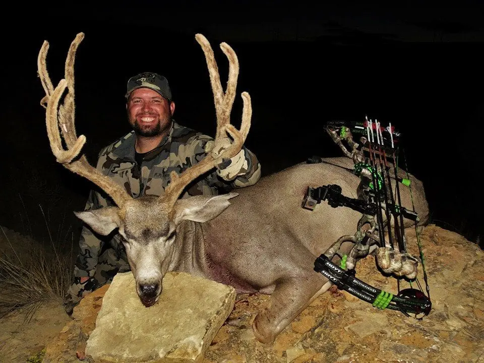 jarrod-client-Wyoming-mule-deer-GPO archery » Outdoors International Jarrod with his archery Wyoming mule deer