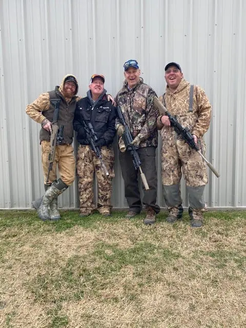 Happy pig hunters