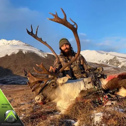 Outdoors International Hunting Consultant Patrick Kissel with his solo archery Haul Road caribou.