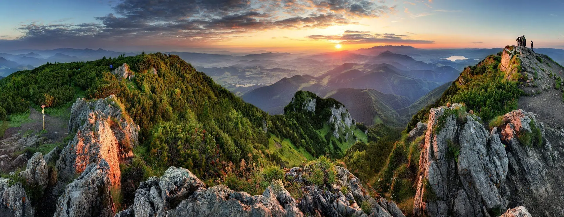 Mountains Hikers Sunrise Green AdobeStock_256148306 » Outdoors International Mountain valley during sunrise. Natural summer landscape in Slovakia