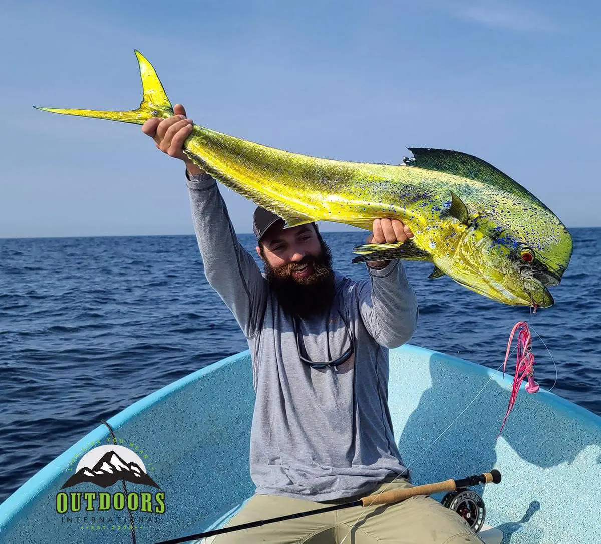 Patrick with a dorado on the fly rod.