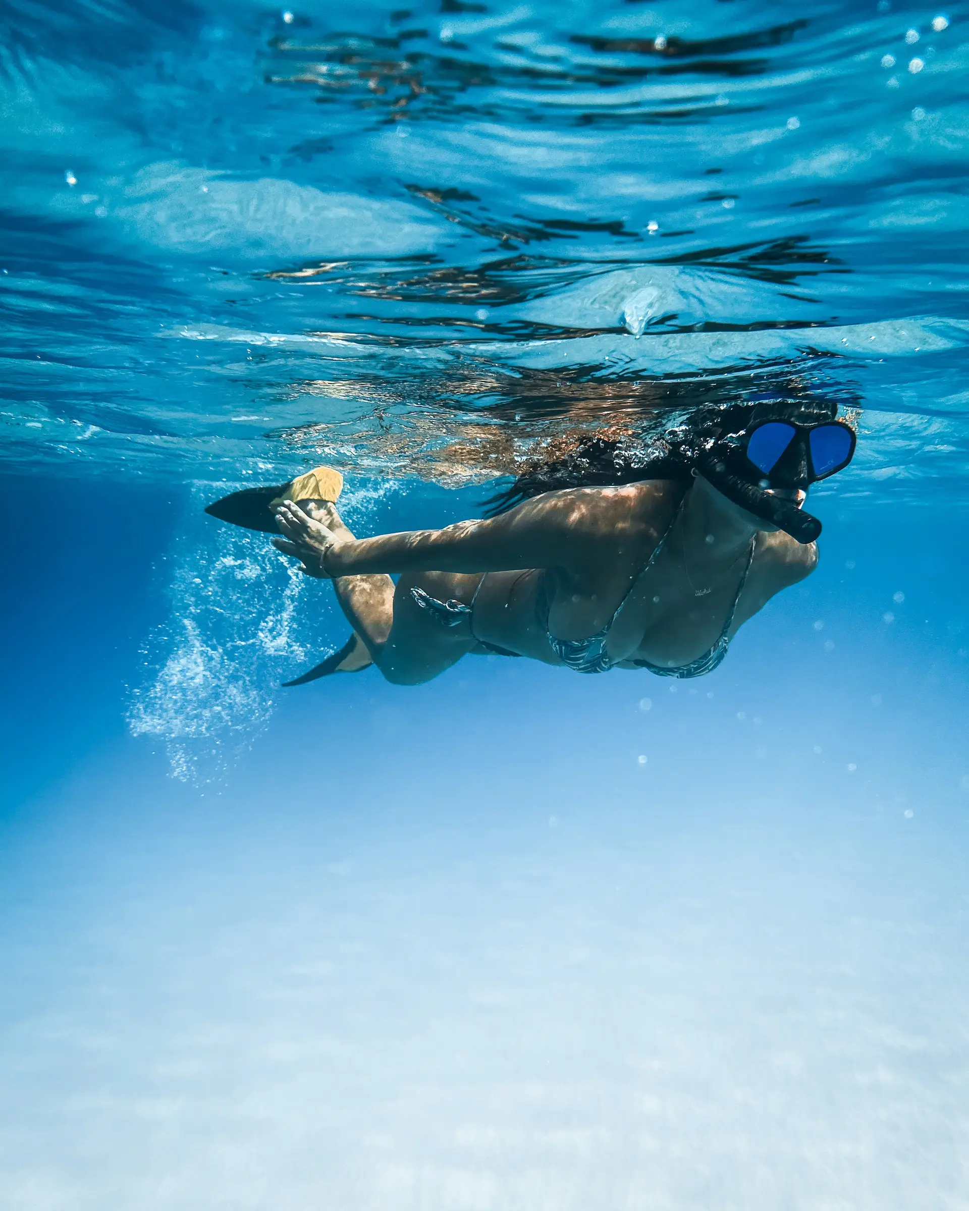 pexels-jess-loiterton-4609196 woman snorkeling belize central america ยป Outdoors International Woman snorkeling
