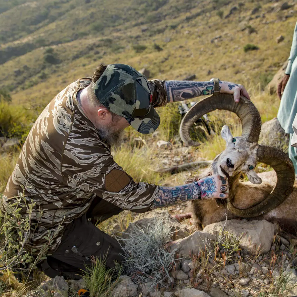 Pakistan Blandford Urial Hunter ARQ8 » Outdoors International Hunter checking out his Blandford urial.