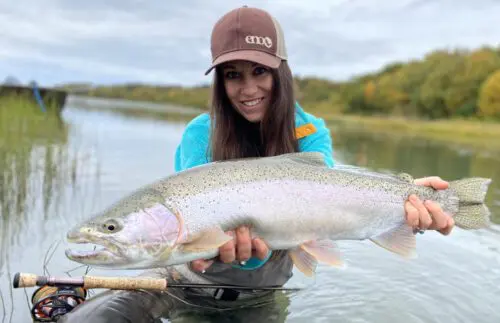 Lacey with a giant rainbow trout