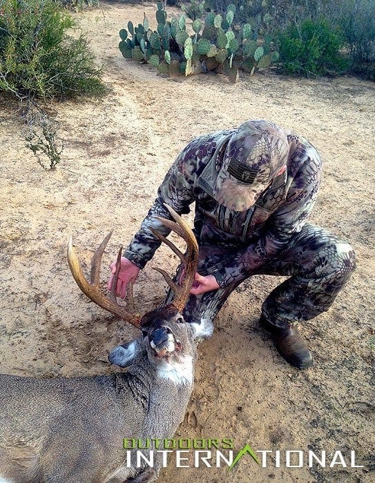 Trevor admiring his buck Indigo