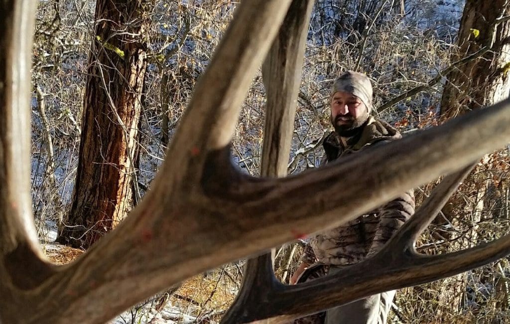 Cory admiring his buck Cory is one happy hunter