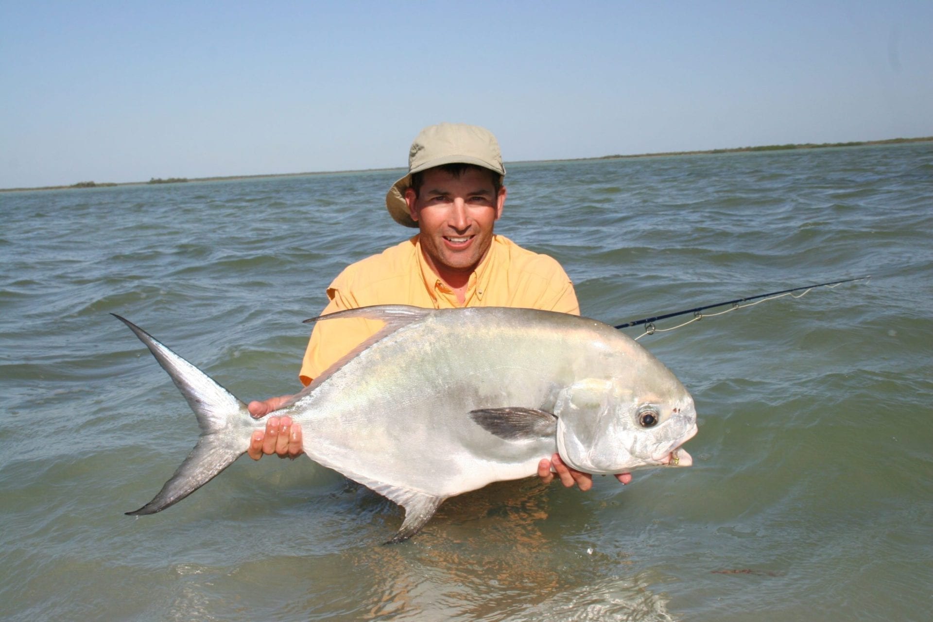 Kent Goodman with a giant permit on the fly