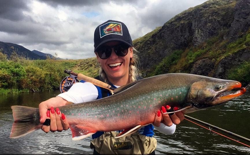 woman fly angler with a beautiful Dolly Varden