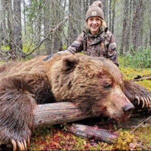Maria with her brown bear