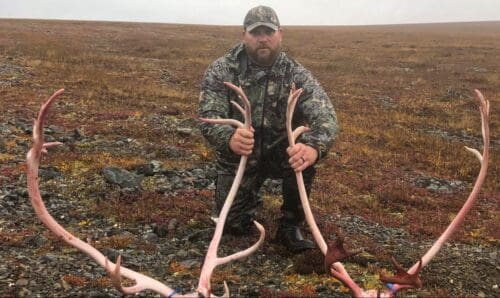 Jesse with the caribou he and Jeff got on their hunt.