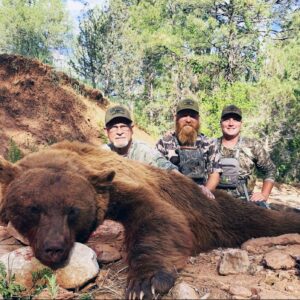 Outdoors International client Michael Hickey with a giant Arizona black bear.