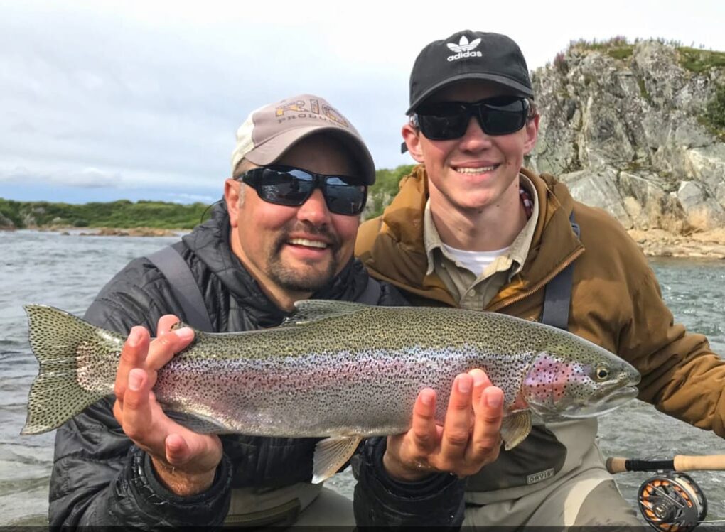 Father son flyfishing on Moraine Creek in Alaska