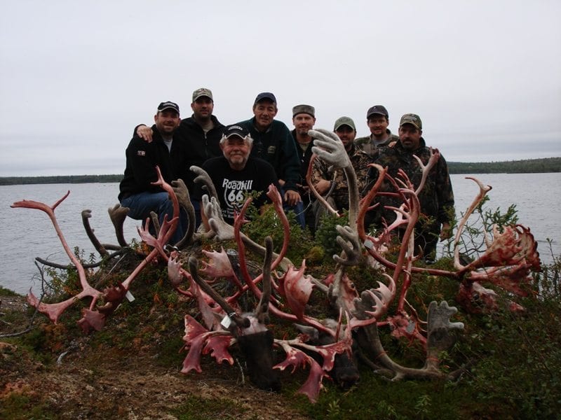 Russ Meyer with some buddies after a successful caribou hunt in Alaska.