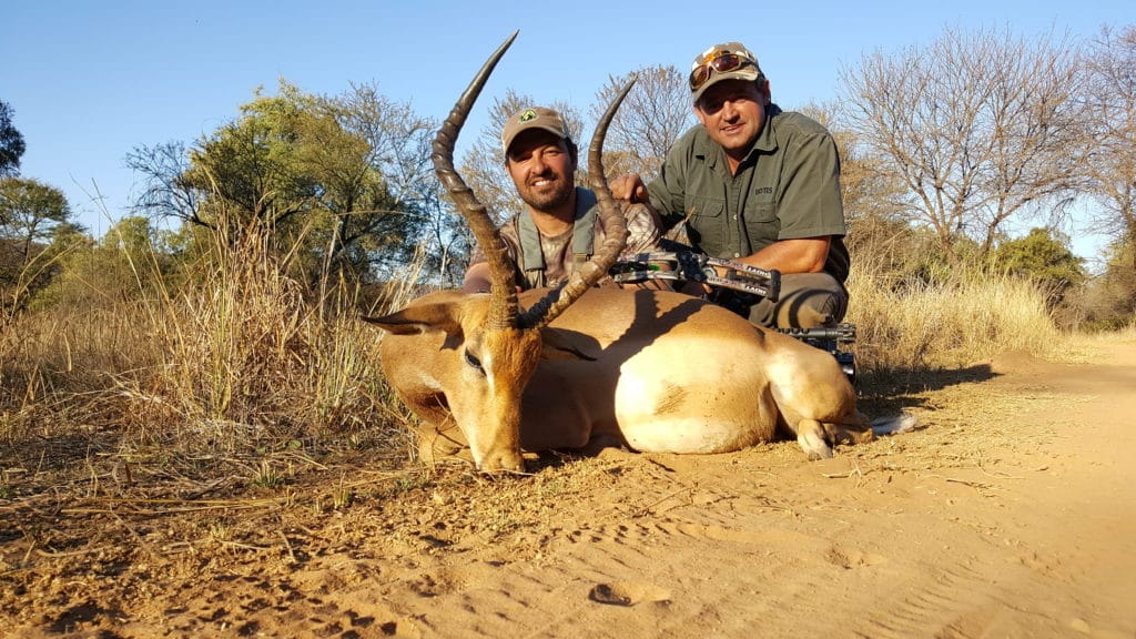Cory and Botes with an impala