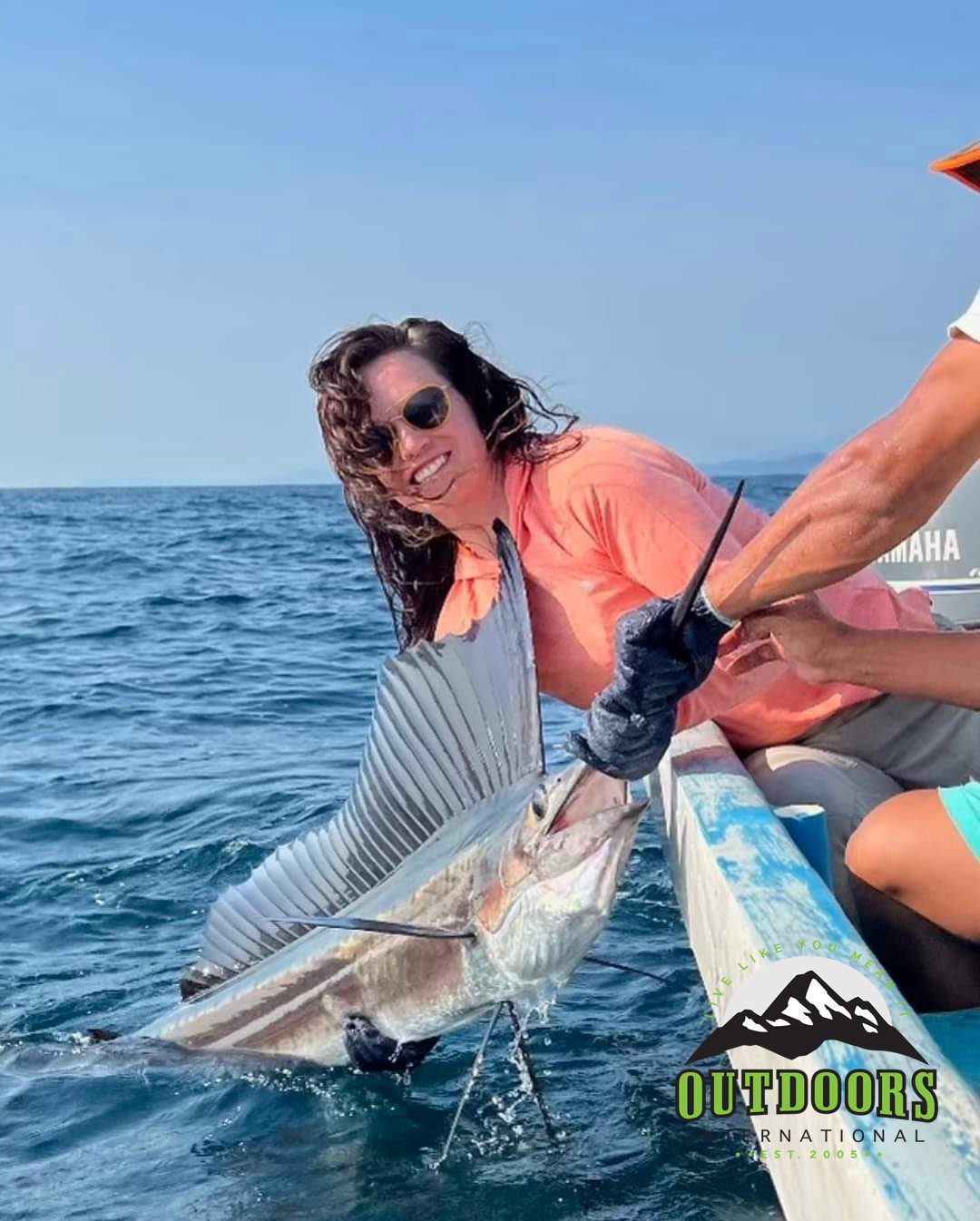 Lacey with her first sailfish