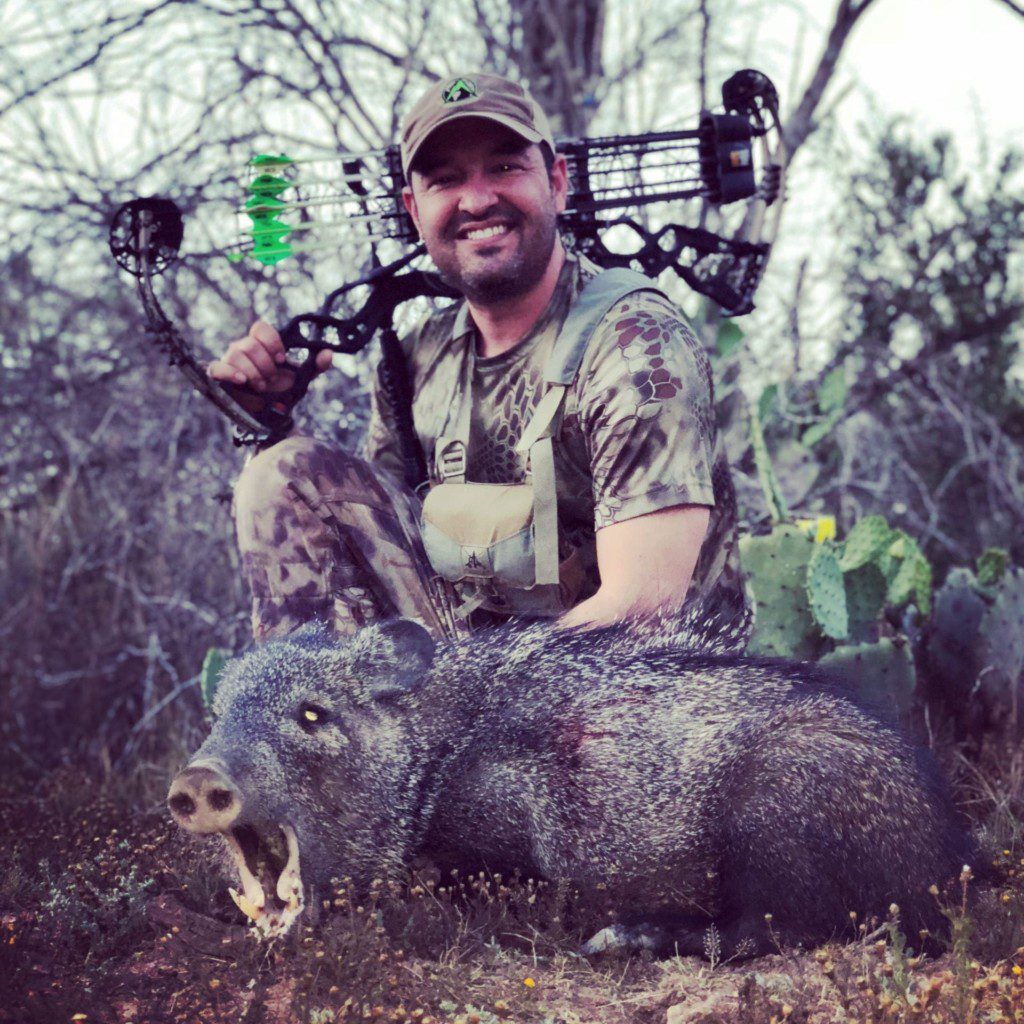 OUTDOORS INTERNATIONAL Founder, Cory Glauner with an archery javelina he took in South Texas