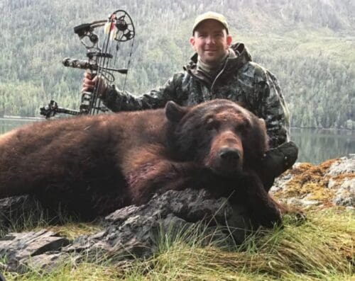 Gary-Colbath-with-a-huge-Alaska-archery black bear » Outdoors International Gary Colbath with a great archery color phase black bear he killed in Alaska.