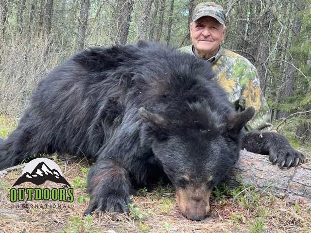 Ron Cherry with his Alberta black bear