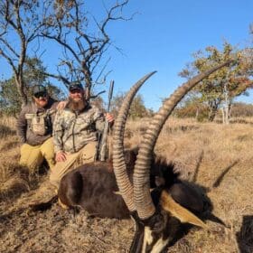 Justin Harkins Client South Africa Sable DwHS » Outdoors International Justin and a nice sable he took in South Africa.