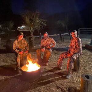 Hunters around the fire at camp in Sonora, Mexico