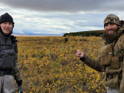 Kyle and John next to a muskox