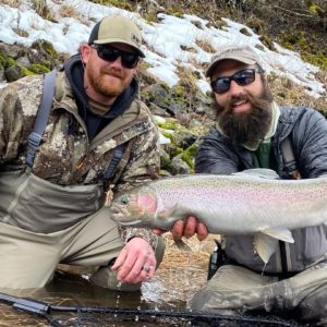 Patrick with another client and a big B Run steelhead