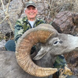 Hunter with Trophy Desert Bighorn