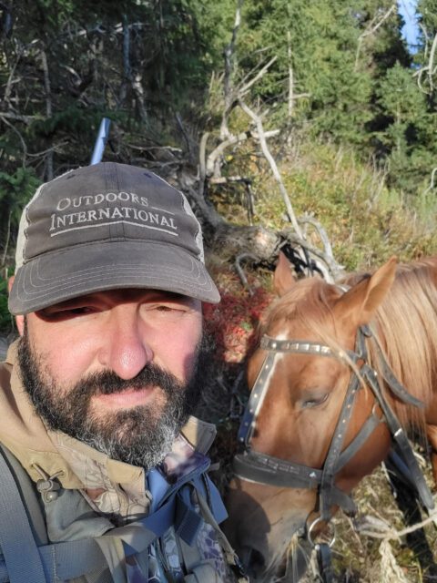 Cory Glauner with his little Kazakhstan horse.