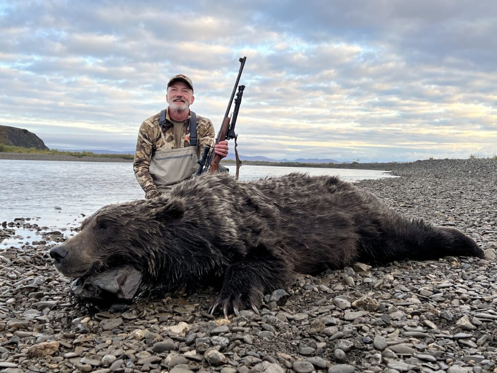 Outdoors International client Jace Poole with a great Arctic grizzly.