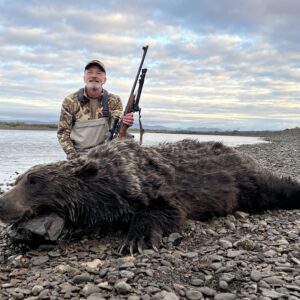 Outdoors International client Jace Poole with a great Arctic grizzly.