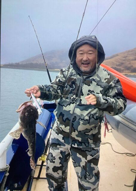 Dan Koshiyama with a lingcod he caught off of Kodiak Island.