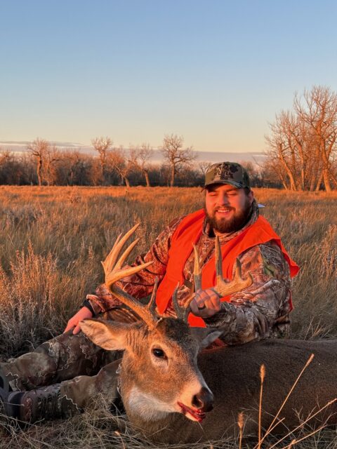 Outdoors International client Jeff Weber with a Montana whitetail.