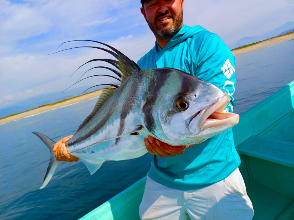 Cory Glauner with a great Roosterfish he caught in Mexico.