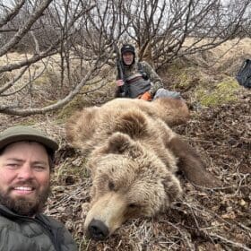 OI client John LeBanc with his 2024 spring brown bear he hunted on the Alaska Peninsula.
