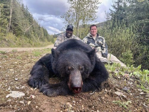 Jarahn with his awesome spot and stalk black bear he hunted in BC.