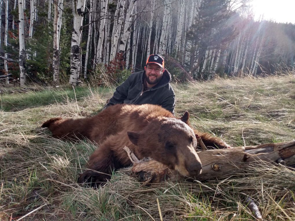 Jason with a great Wyoming spot-and-stalk, color phase black bear.