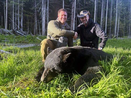 Joshua with his giant black bear.