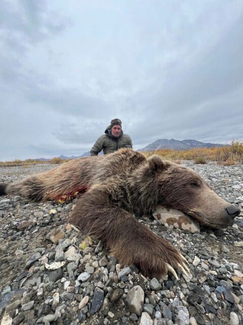 Randy Taylor Client Alaska Arctic Grizzly Bear AWCG » Outdoors International Randy Taylor with his great Arctic Grizzly bear.