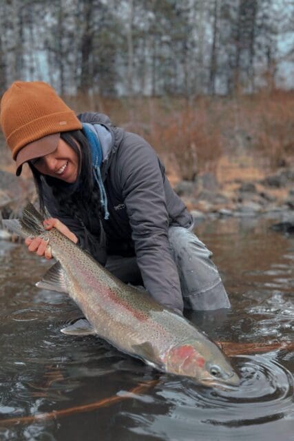 Lacey Savage with a giant steelhead