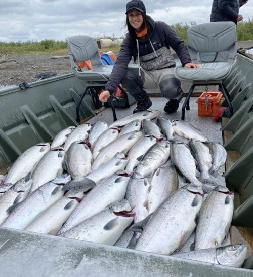 Lacey with a pile of salmon