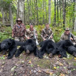 A group of successful black bear hunters at our lodge in New Brunswick.