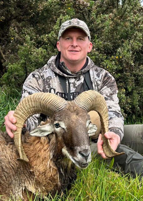 Kevin with a Hawaiian mouflon ram.