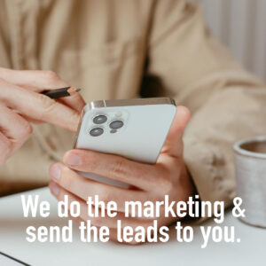 Outfitter looking at a new lead on his phone.