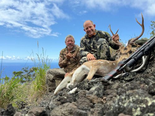 Charles with a hard earned Axis buck in Hawaii.