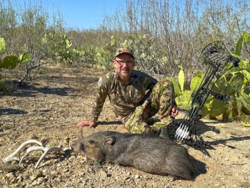 Gary with a Texas Javelina he shot with his bow.