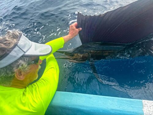 Randell Heath with one of his sailfish.