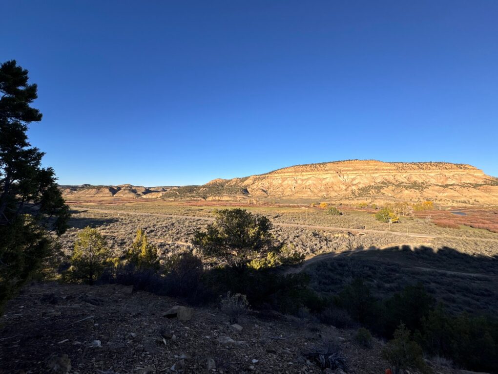 Cory Glauner — mesa and sagebrush valley at golden hour (Colorado, 2026)