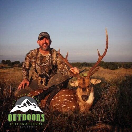 Garrett Futrell — axis deer buck in open grassland (Texas, 2017)