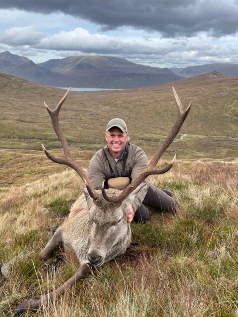 Kyle Apple — red stag on Scottish Highland hillside (Scotland, 2026)